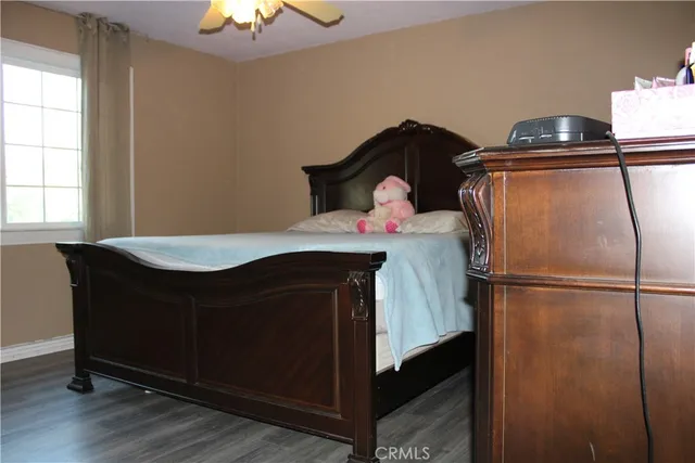 a kitchen with a refrigerator and cabinets