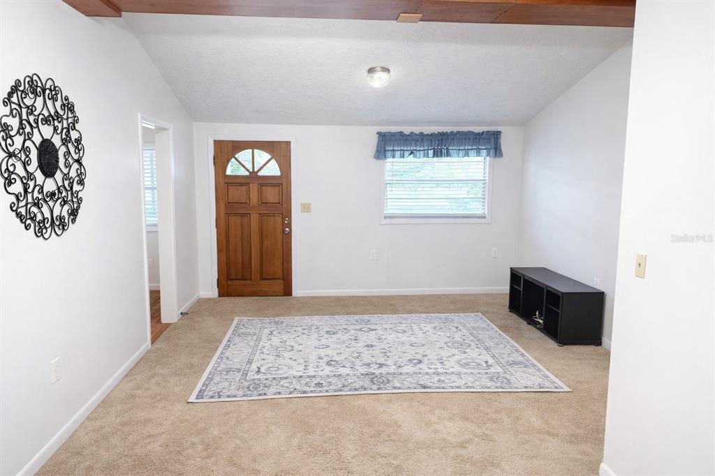 10019 Curley Road San Antonio, FL 33576 - Photo 3 of 10 a view of an empty room