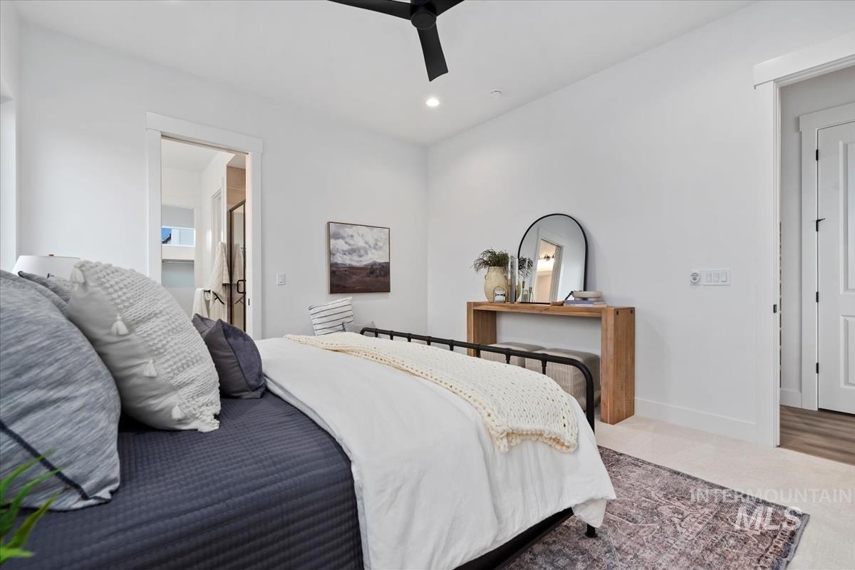 735 South Calhoun Lane Star, ID 83669 - Photo 22 of 47 Bedroom with a ceiling fan, recessed lighting, and ensuite bathroom