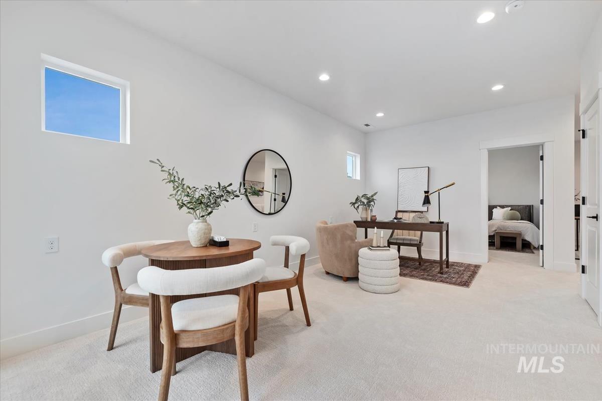 735 South Calhoun Lane Star, ID 83669 - Photo 29 of 47 Dining area with light colored carpet and recessed lighting