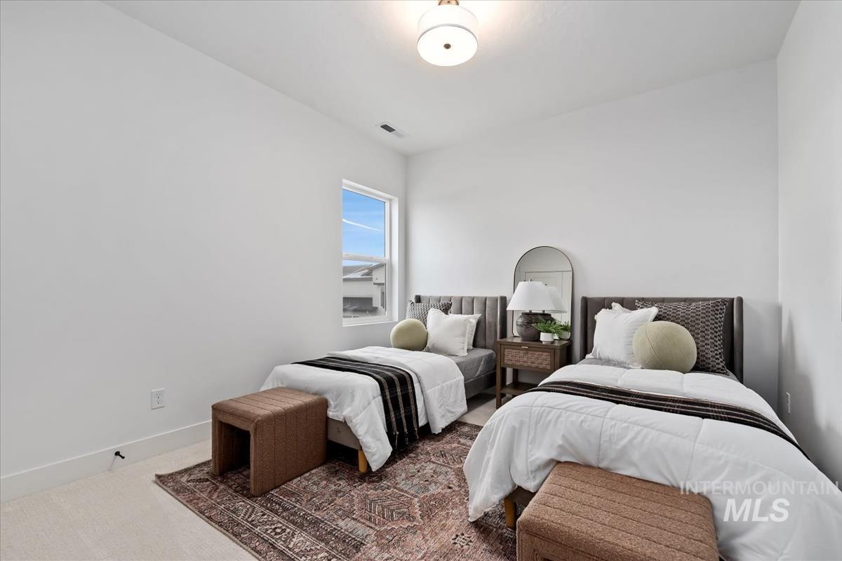 735 South Calhoun Lane Star, ID 83669 - Photo 31 of 47 Bedroom featuring carpet and baseboards