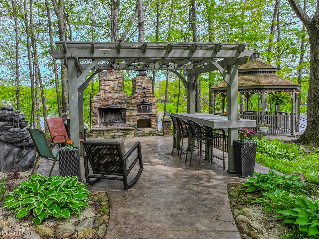 1055 Lode Star Drive Rome, OH 44085 - Photo 7 of 12 Outdoor living area with Pergola