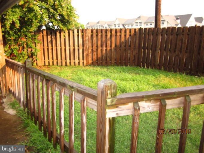 2033 Ormand Road Dundalk, MD 21222 - Photo 7 of 11 a view of a wooden fence