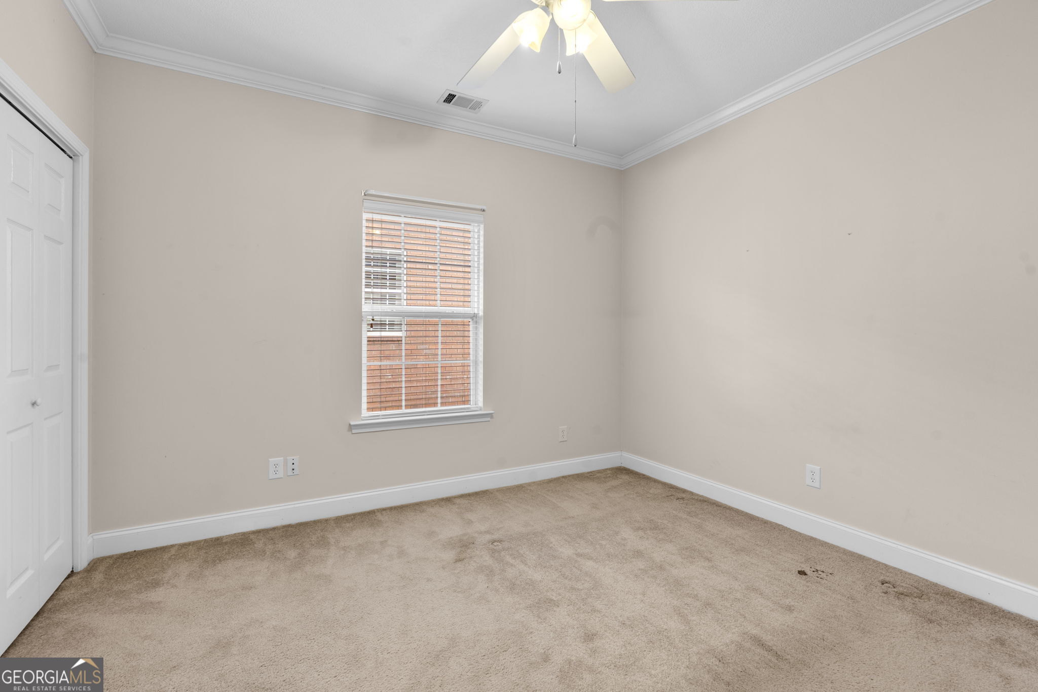 310 Pebble Beach Drive Perry, GA 31069 - Photo 15 of 42 an empty room with a window