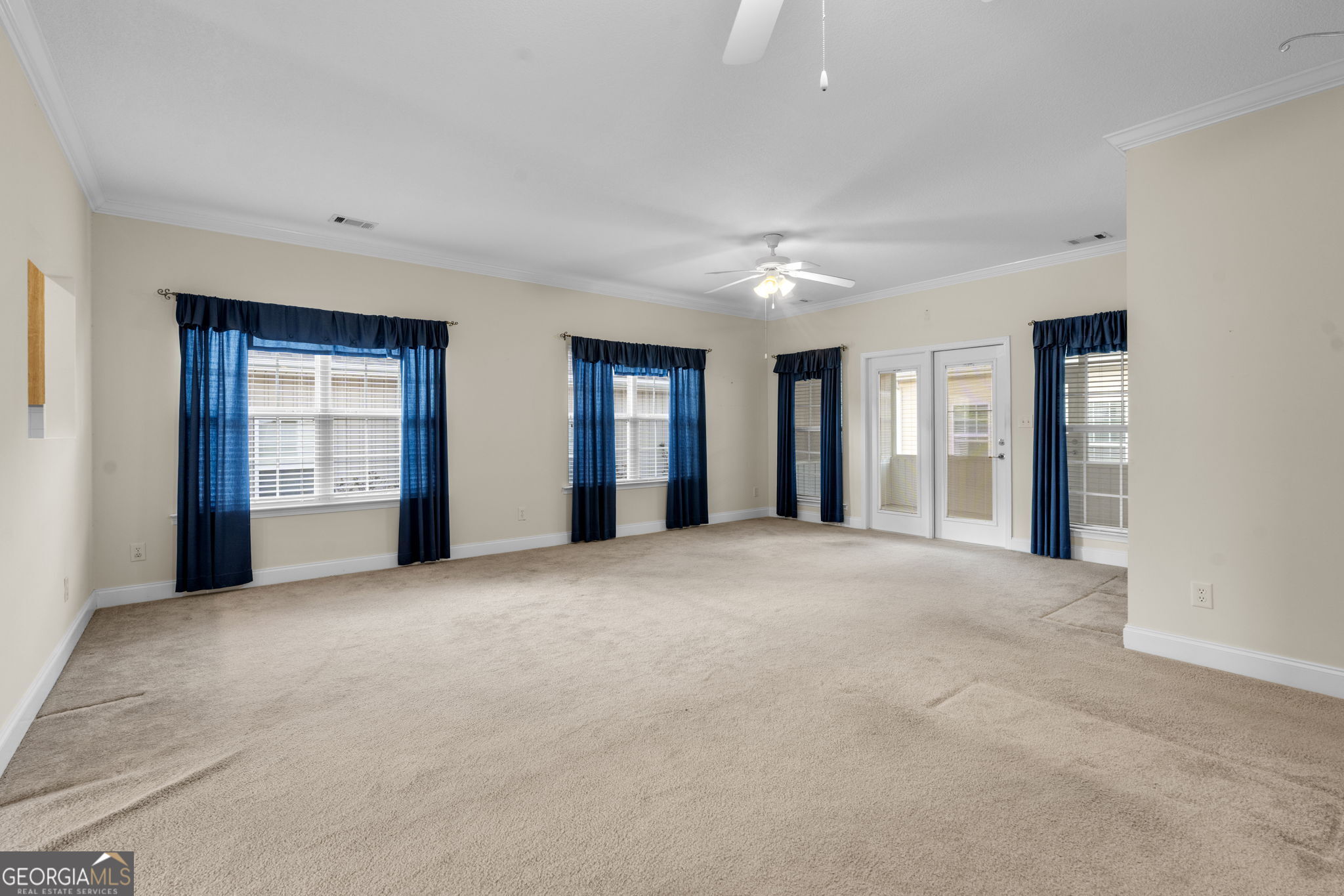 310 Pebble Beach Drive Perry, GA 31069 - Photo 29 of 42 a view of an empty room with closet and window