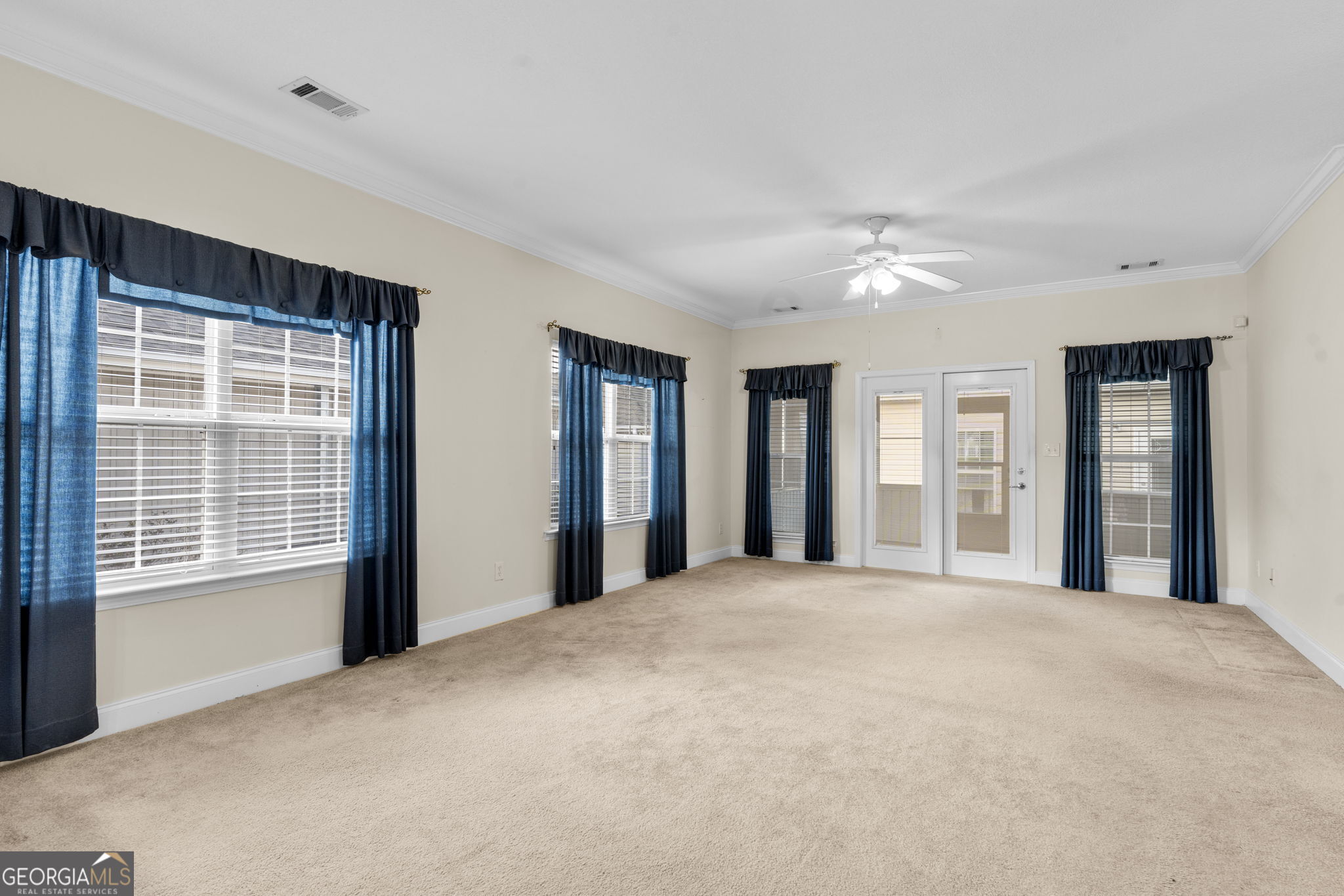 310 Pebble Beach Drive Perry, GA 31069 - Photo 30 of 42 a view of an empty room with windows and closet