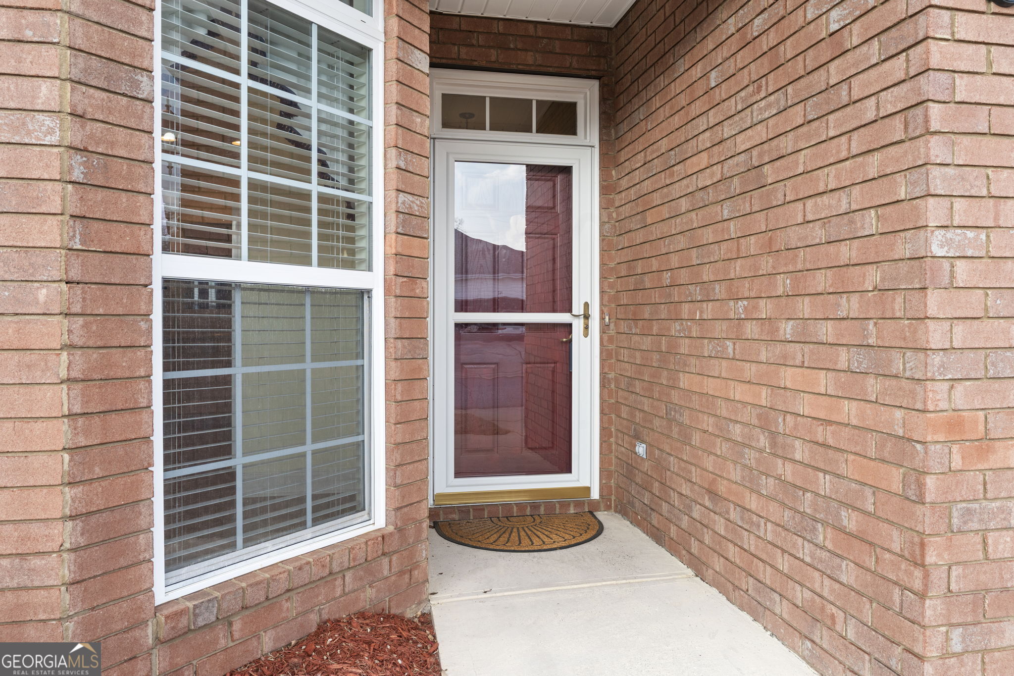 310 Pebble Beach Drive Perry, GA 31069 - Photo 3 of 42 a front view of a house with a window