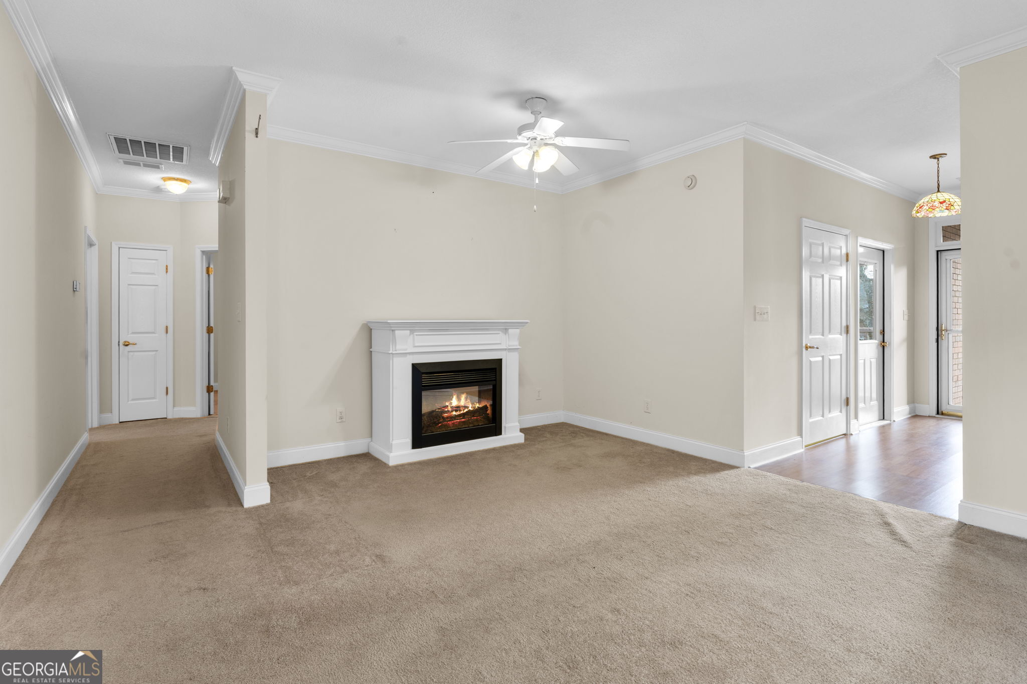 310 Pebble Beach Drive Perry, GA 31069 - Photo 34 of 42 a view of an empty room with a fireplace