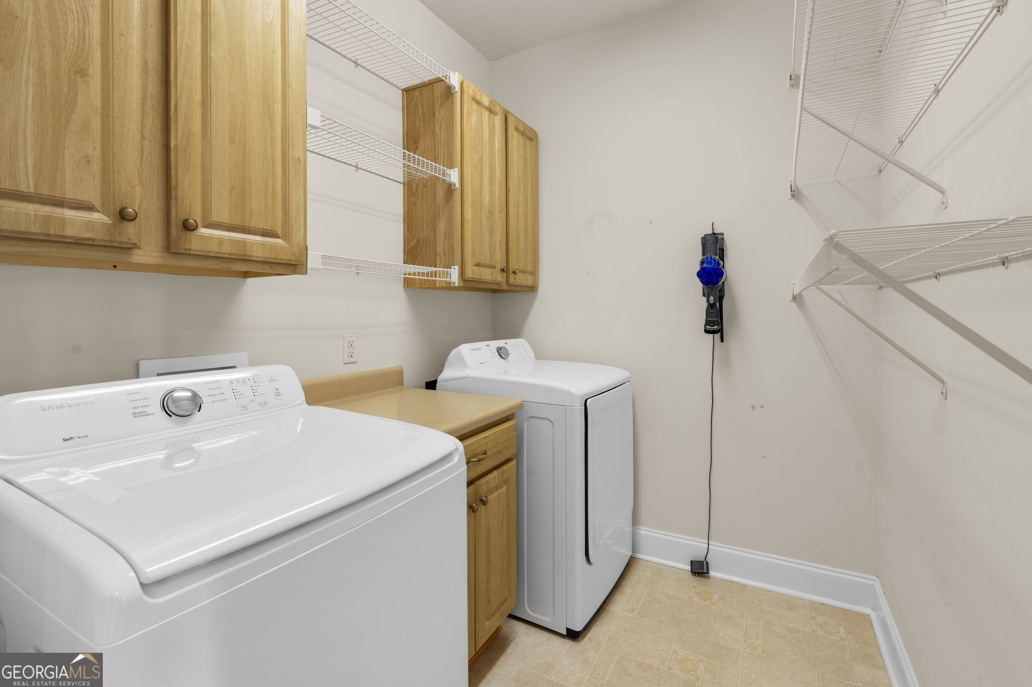 310 Pebble Beach Drive Perry, GA 31069 - Photo 39 of 42 a utility room with dryer and washer