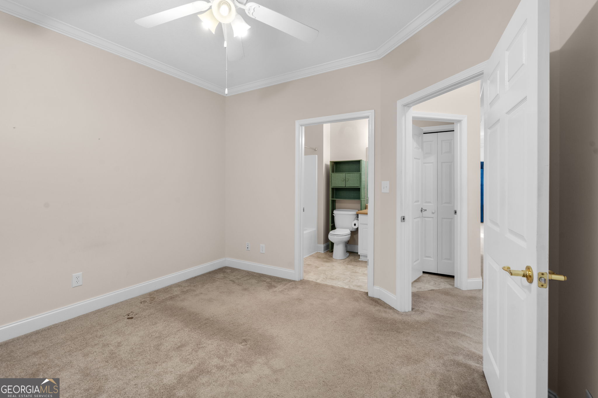 310 Pebble Beach Drive Perry, GA 31069 - Photo 41 of 42 an empty room and chandelier fan