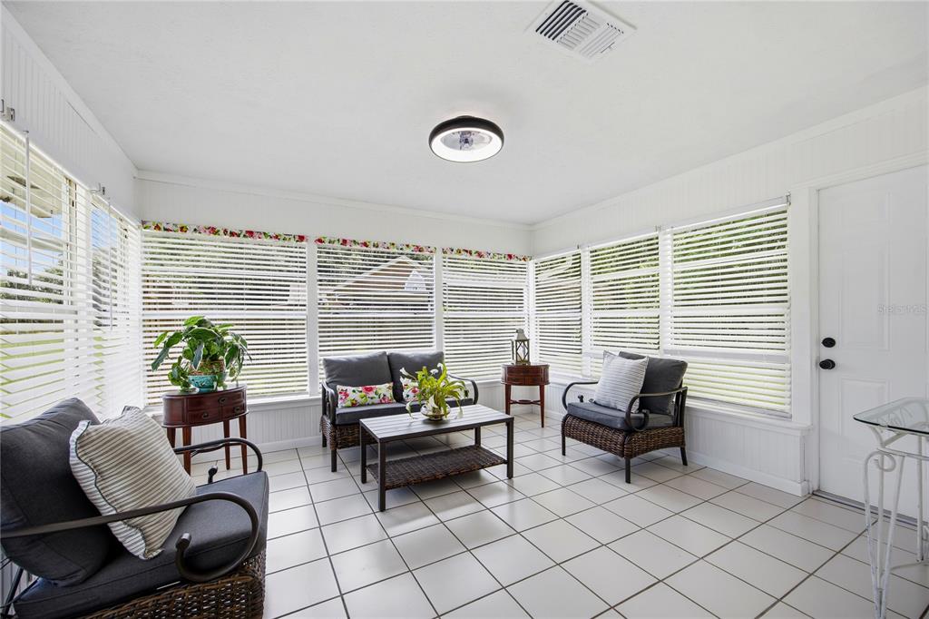 113 Browns Road San Mateo, FL 32187 - Photo 11 of 36 a living room with furniture and a window