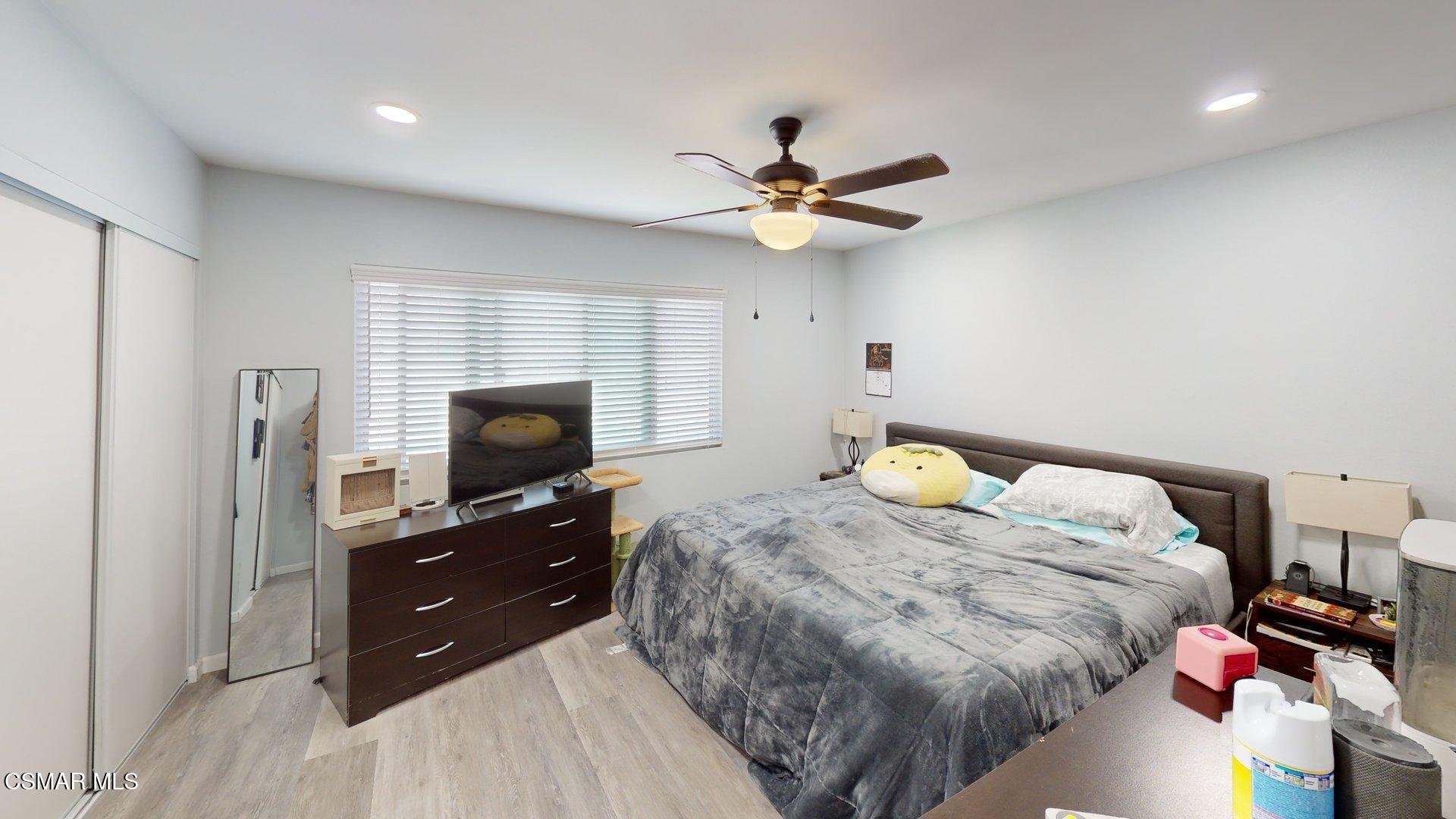 3075 Kelp Lane Oxnard, CA 93035 - Photo 14 of 22 a bedroom with a bed and a flat screen tv