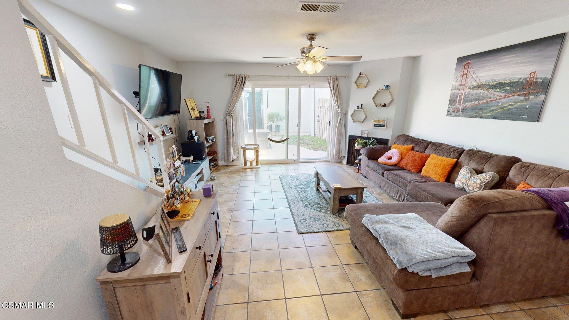 3075 Kelp Lane Oxnard, CA 93035 - Photo 2 of 22 a living room with furniture and a flat screen tv