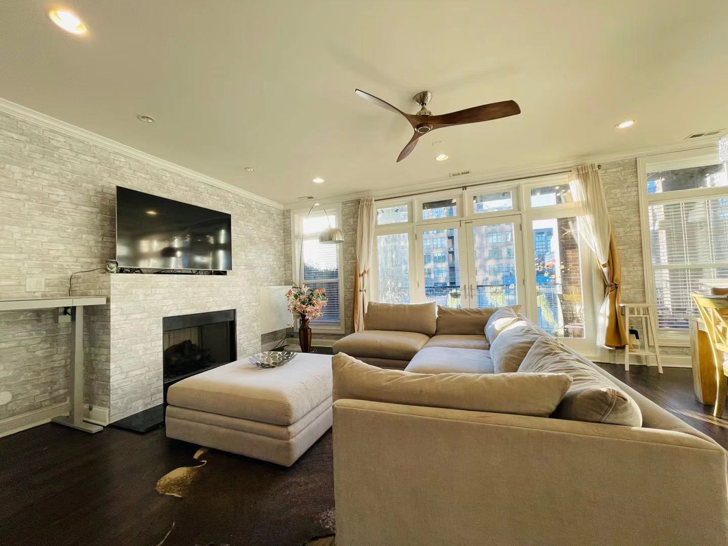 39 North Morgan Street, Unit 3 Chicago, IL 60607 - Photo 2 of 17 a living room with furniture and a fireplace