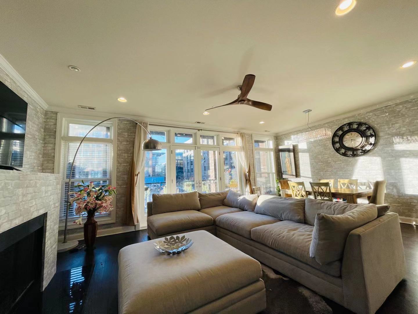 39 North Morgan Street, Unit 3 Chicago, IL 60607 - Photo 3 of 17 a living room with furniture and a large window