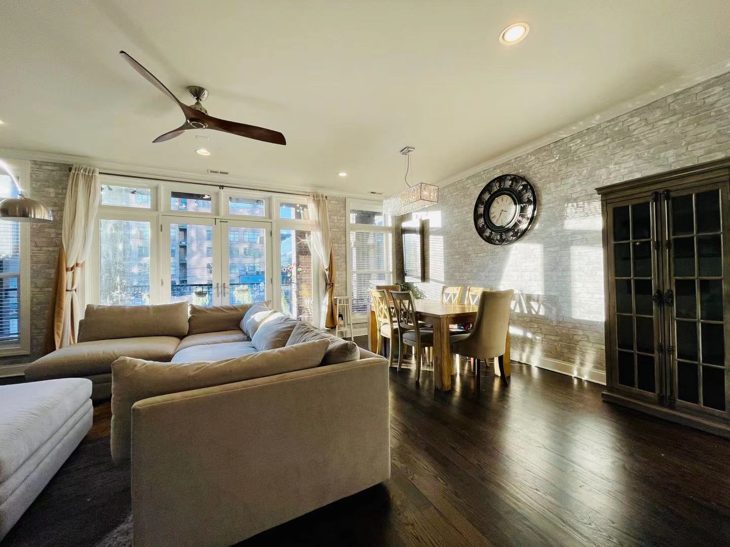 39 North Morgan Street, Unit 3 Chicago, IL 60607 - Photo 5 of 17 a living room with furniture and wooden floor