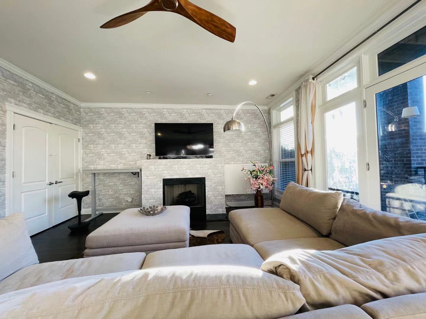 39 North Morgan Street, Unit 3 Chicago, IL 60607 - Photo 6 of 17 a bedroom with furniture and a fireplace