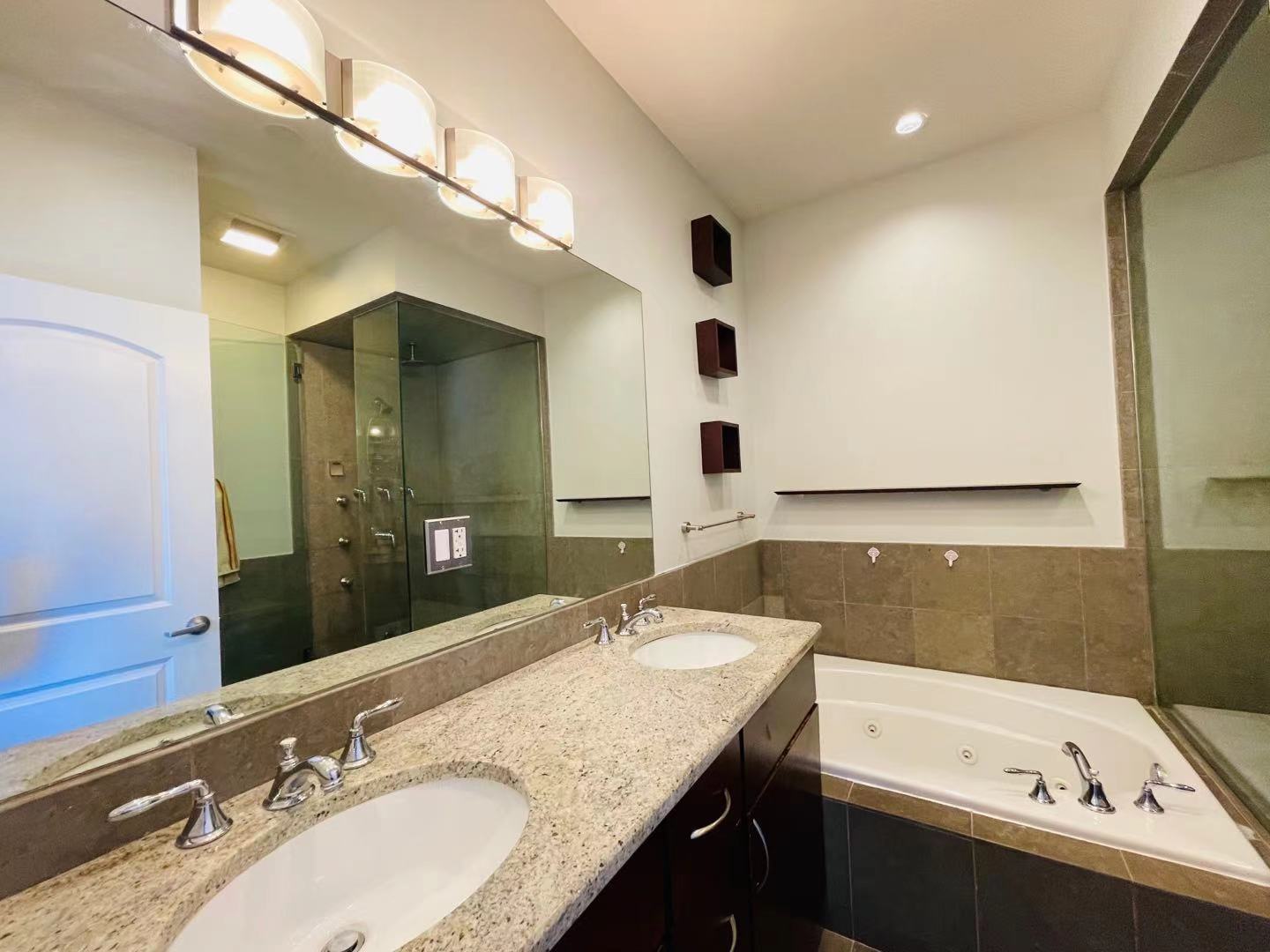 39 North Morgan Street, Unit 3 Chicago, IL 60607 - Photo 8 of 17 a bathroom with a granite countertop sink mirror and bathtub
