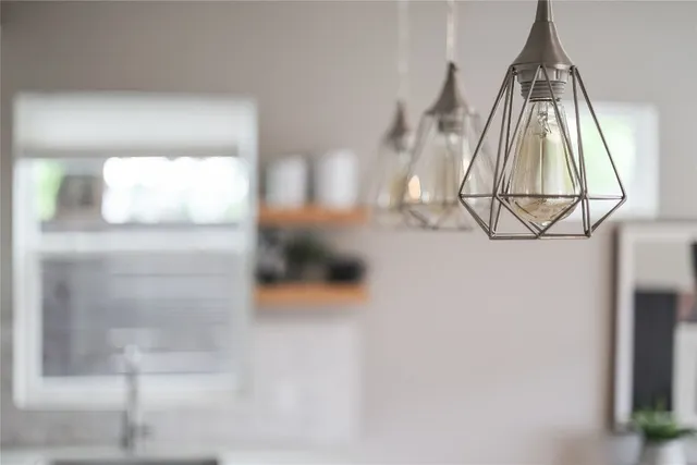 a view of staircase with white walls door