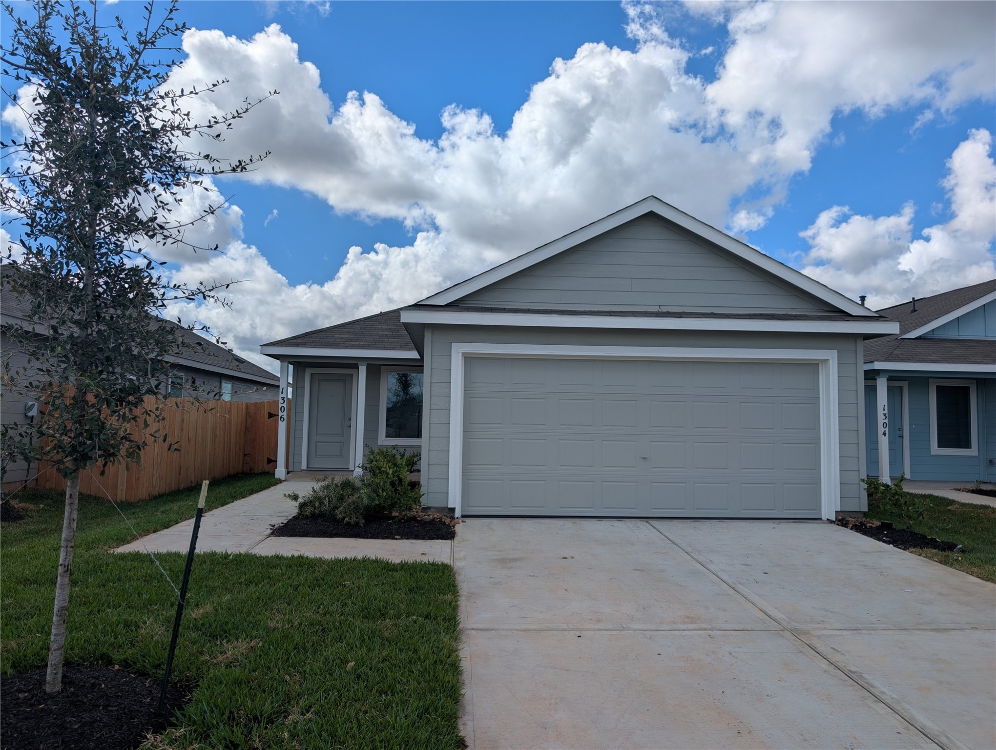 1306 Charlotte Way Wharton, TX 77488 - Photo 1 of 16 a view of a house with backyard and garden
