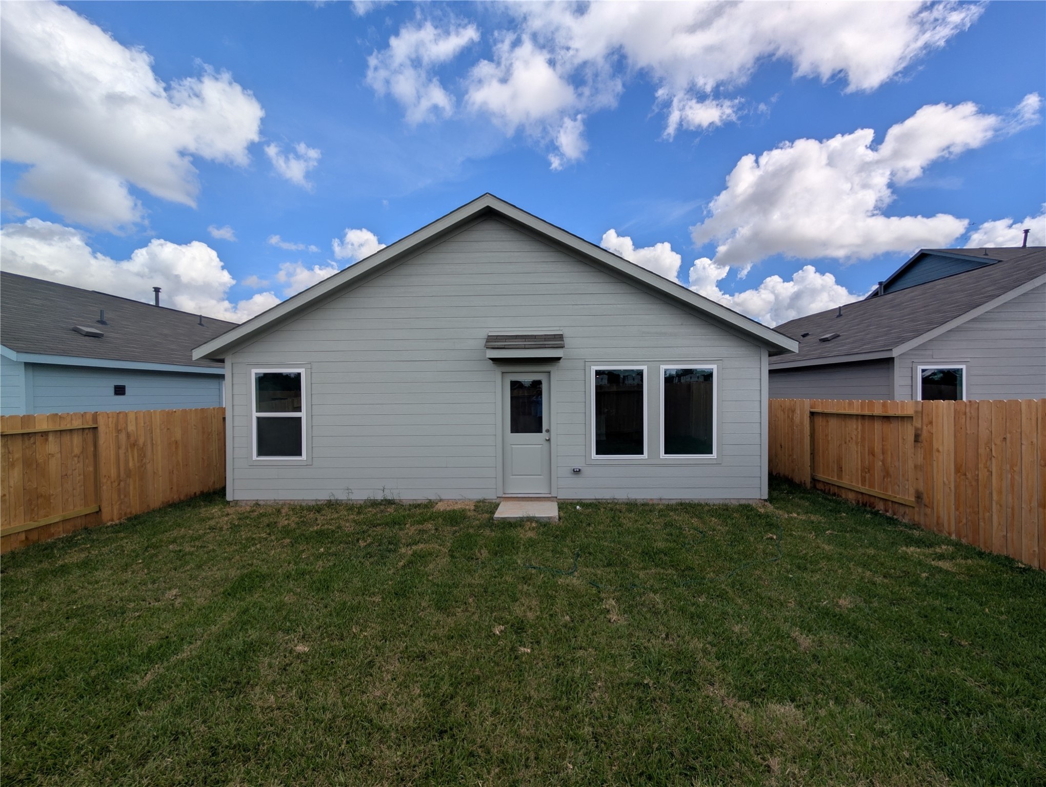1306 Charlotte Way Wharton, TX 77488 - Photo 2 of 16 a house view with a garden space