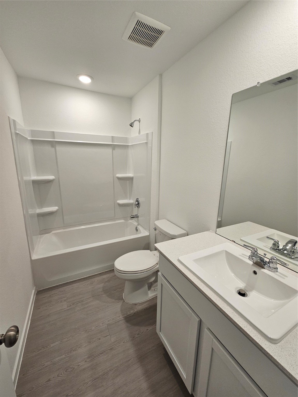 1306 Charlotte Way Wharton, TX 77488 - Photo 8 of 16 a bathroom with a sink a toilet and shower