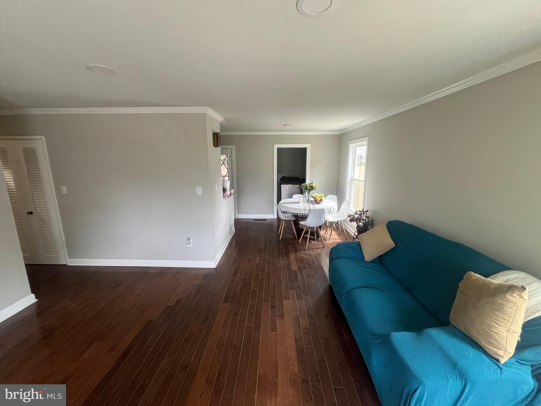 4111 Lawrence Street Alexandria, VA 22309 - Photo 21 of 42 a living room with furniture and a wooden floor