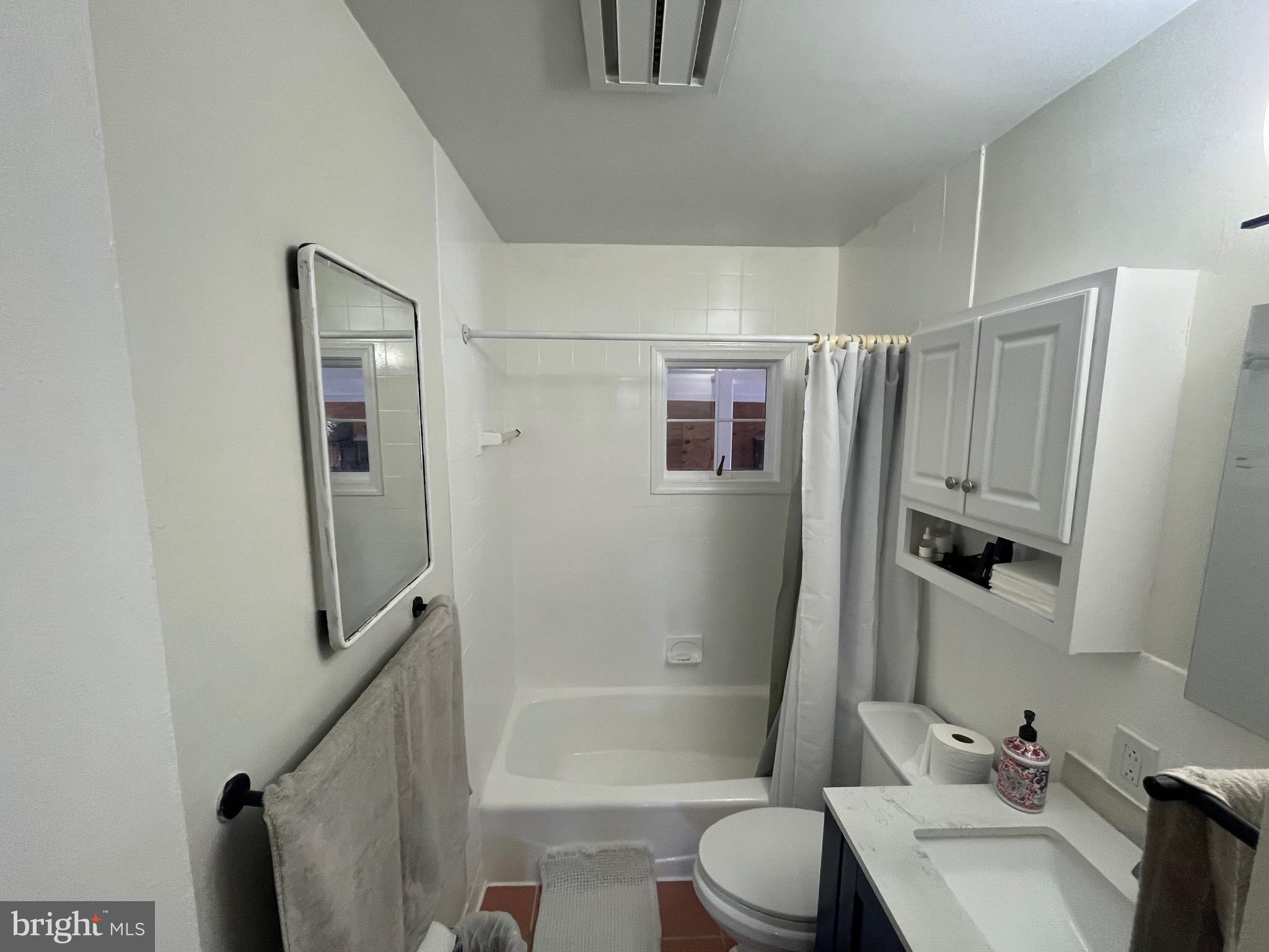 4111 Lawrence Street Alexandria, VA 22309 - Photo 24 of 42 a bathroom with a sink toilet and shower