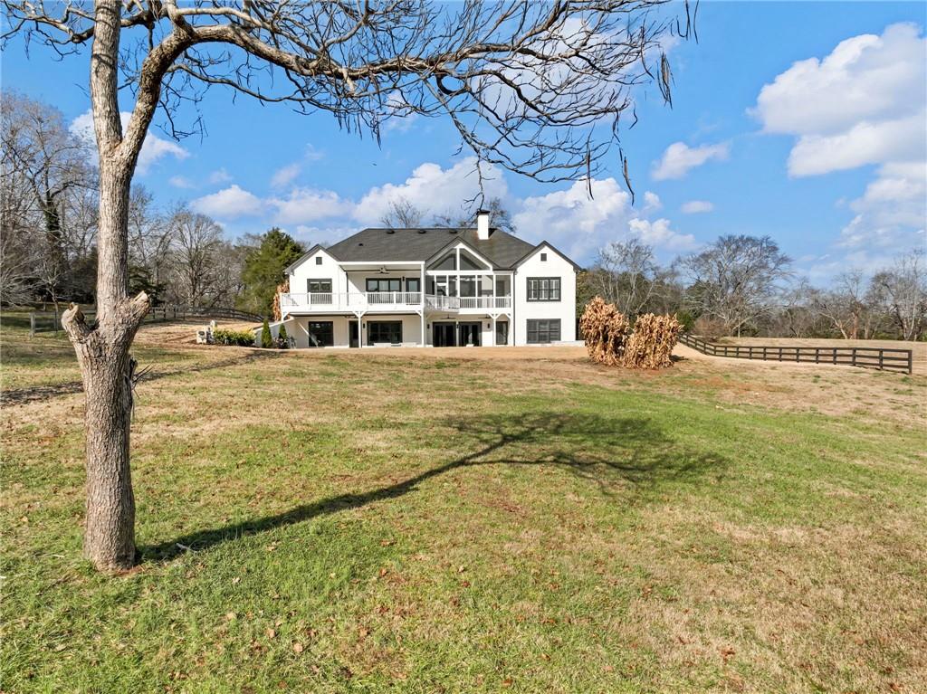 5651 Old Wilkie Road Gainesville, GA 30506 - Photo 5 of 65 a view of a house with a big yard