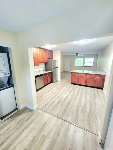 a bed room with a bed and a dresser