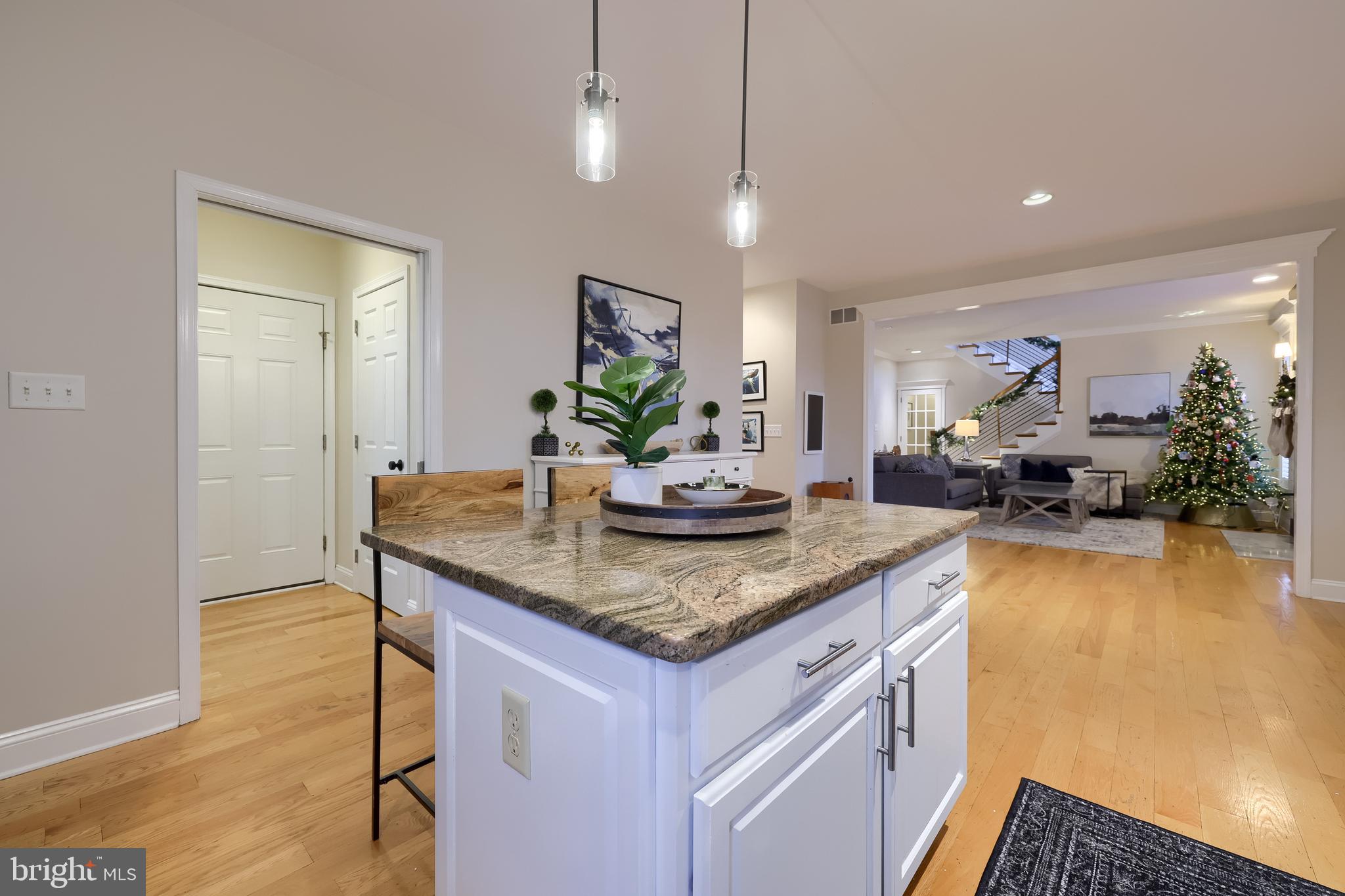 307 Bowyer Lane Lititz, PA 17543 - Photo 25 of 64 a kitchen with stainless steel appliances granite countertop a sink a stove and a wooden floors