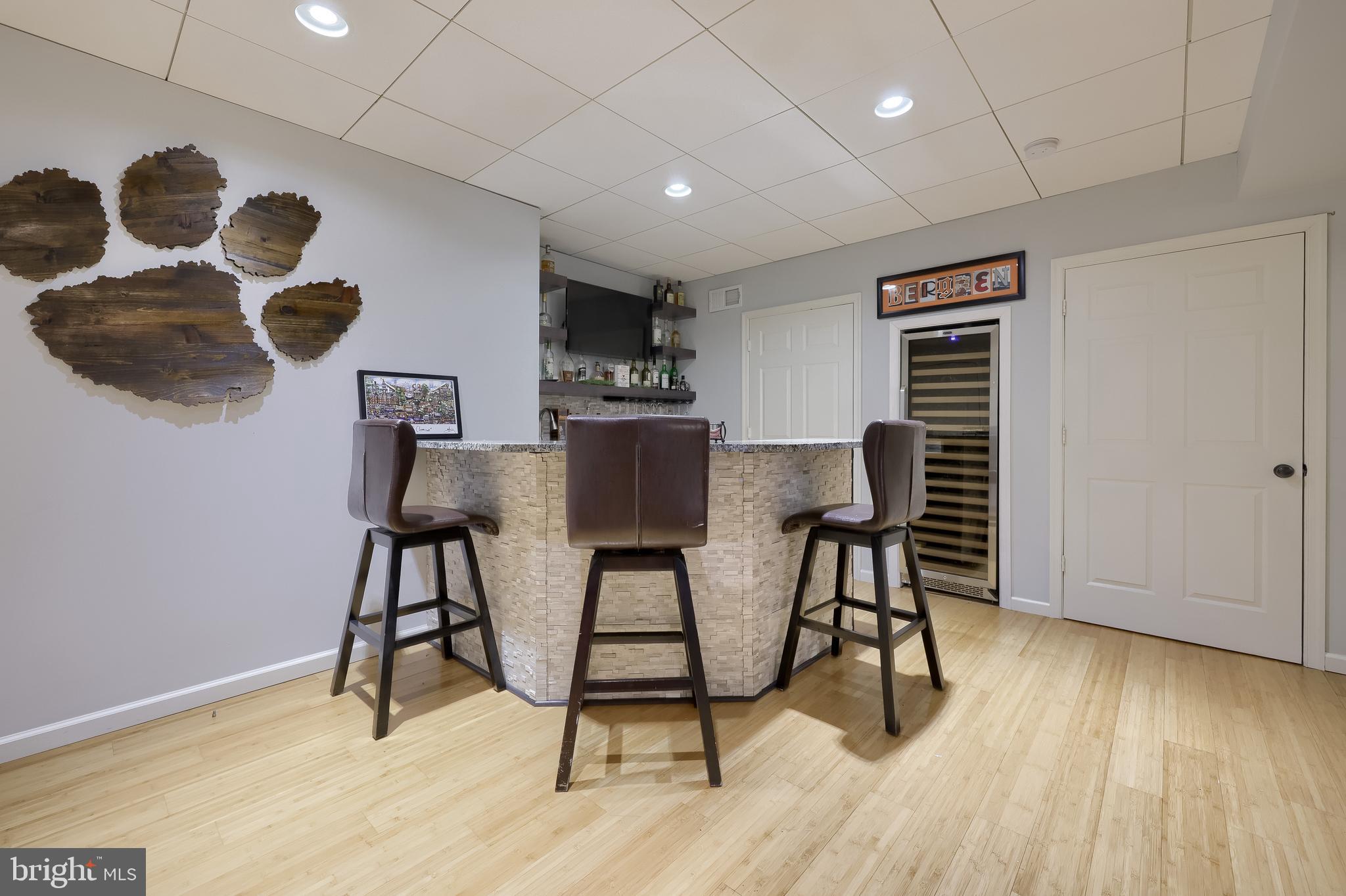 307 Bowyer Lane Lititz, PA 17543 - Photo 35 of 64 a view of a dining room with furniture and wooden floor