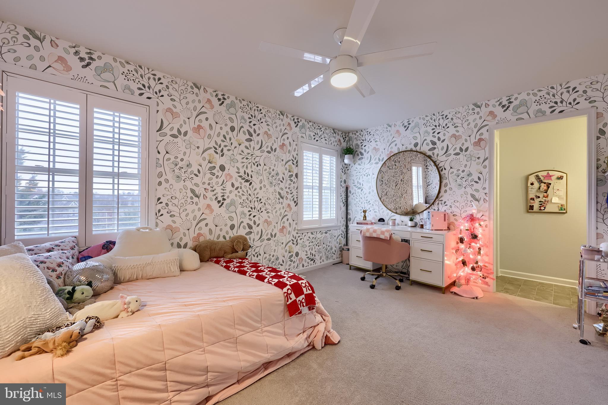 307 Bowyer Lane Lititz, PA 17543 - Photo 48 of 64 a bedroom with a bed mirror and a window