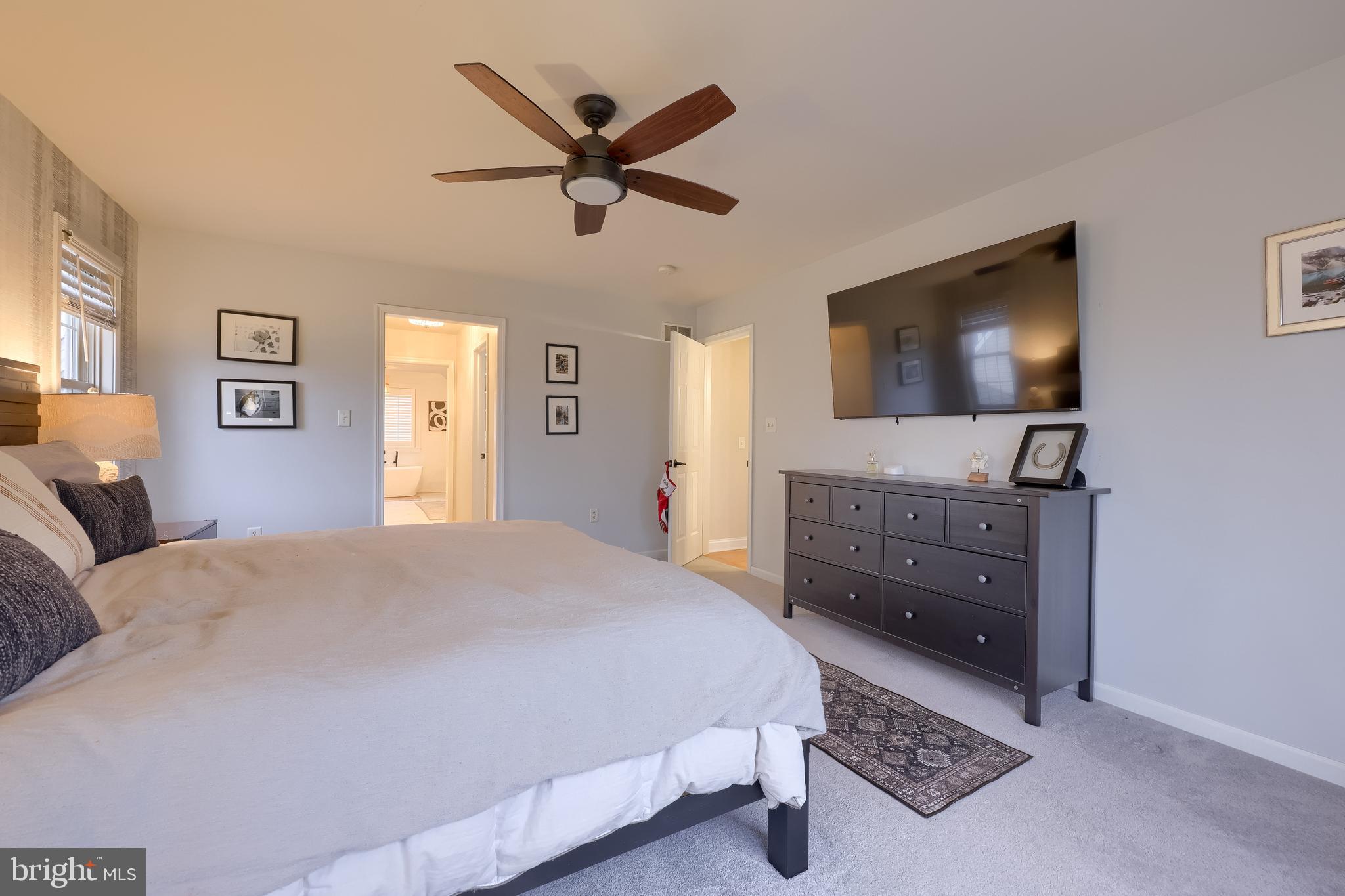 307 Bowyer Lane Lititz, PA 17543 - Photo 54 of 64 a bedroom with a bed and a flat screen tv