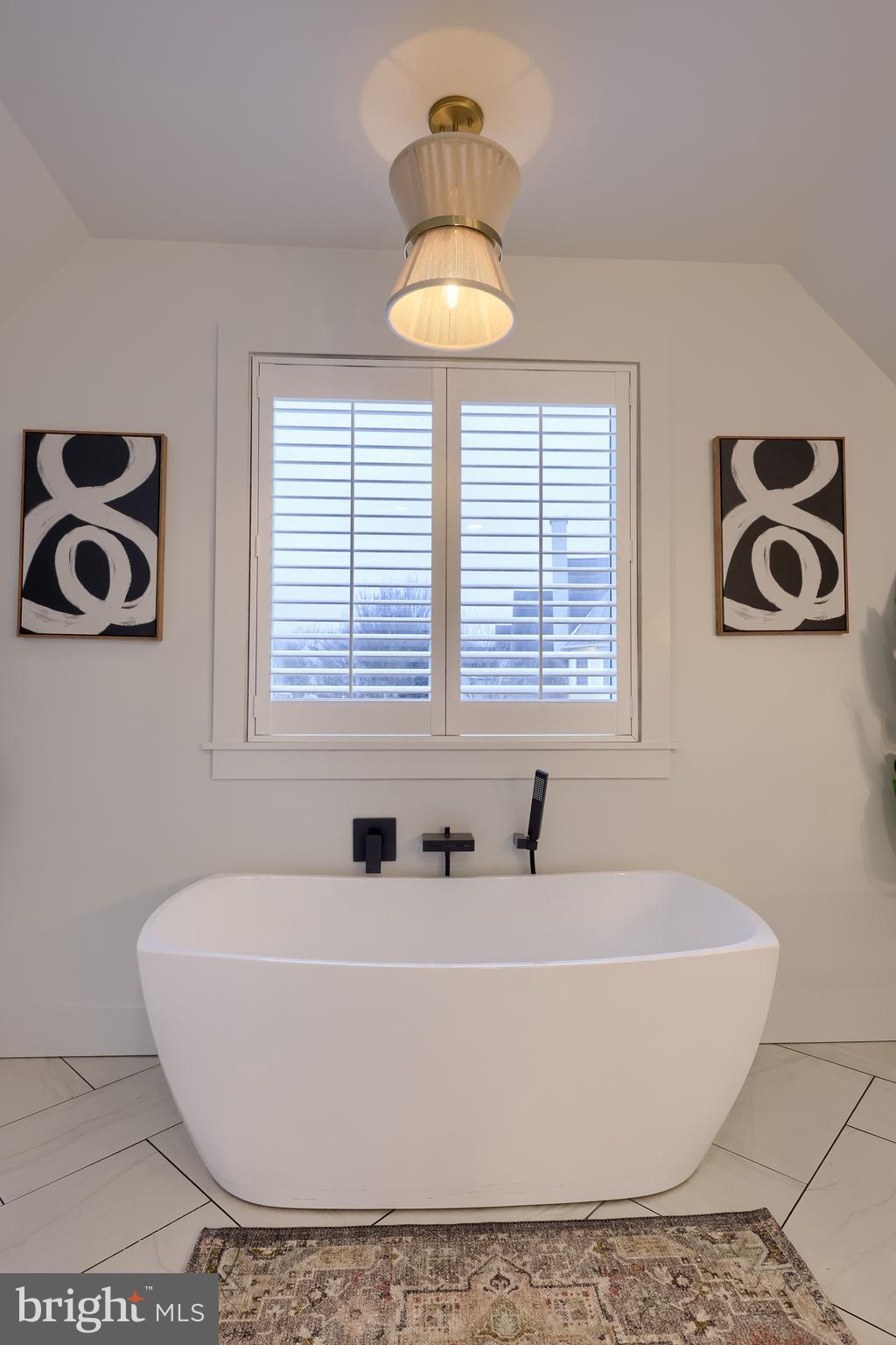 307 Bowyer Lane Lititz, PA 17543 - Photo 56 of 64 a white bath tub sitting in a bathroom next to a window