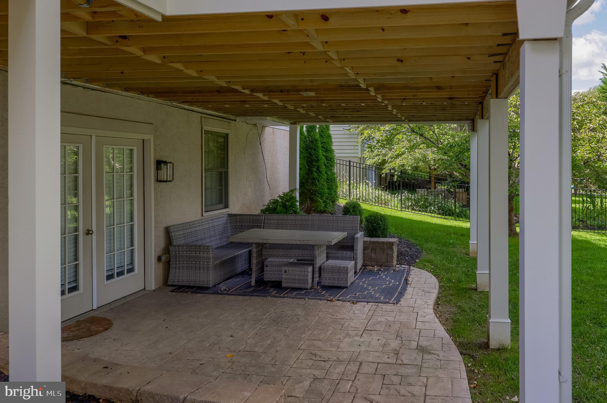307 Bowyer Lane Lititz, PA 17543 - Photo 63 of 64 a view of a patio with a table chairs and a backyard