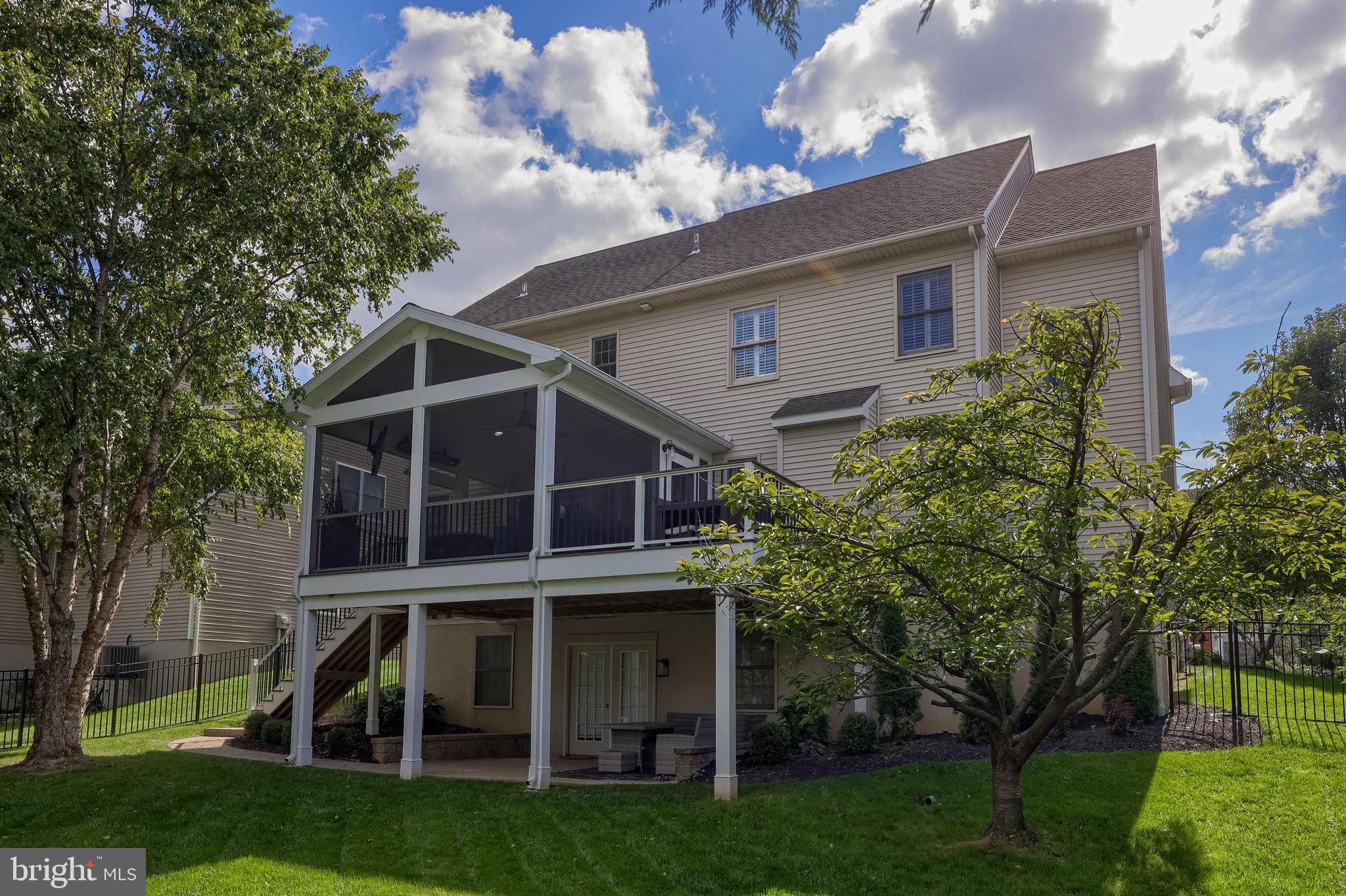 307 Bowyer Lane Lititz, PA 17543 - Photo 64 of 64 a view of house with a big yard and potted plants and large trees