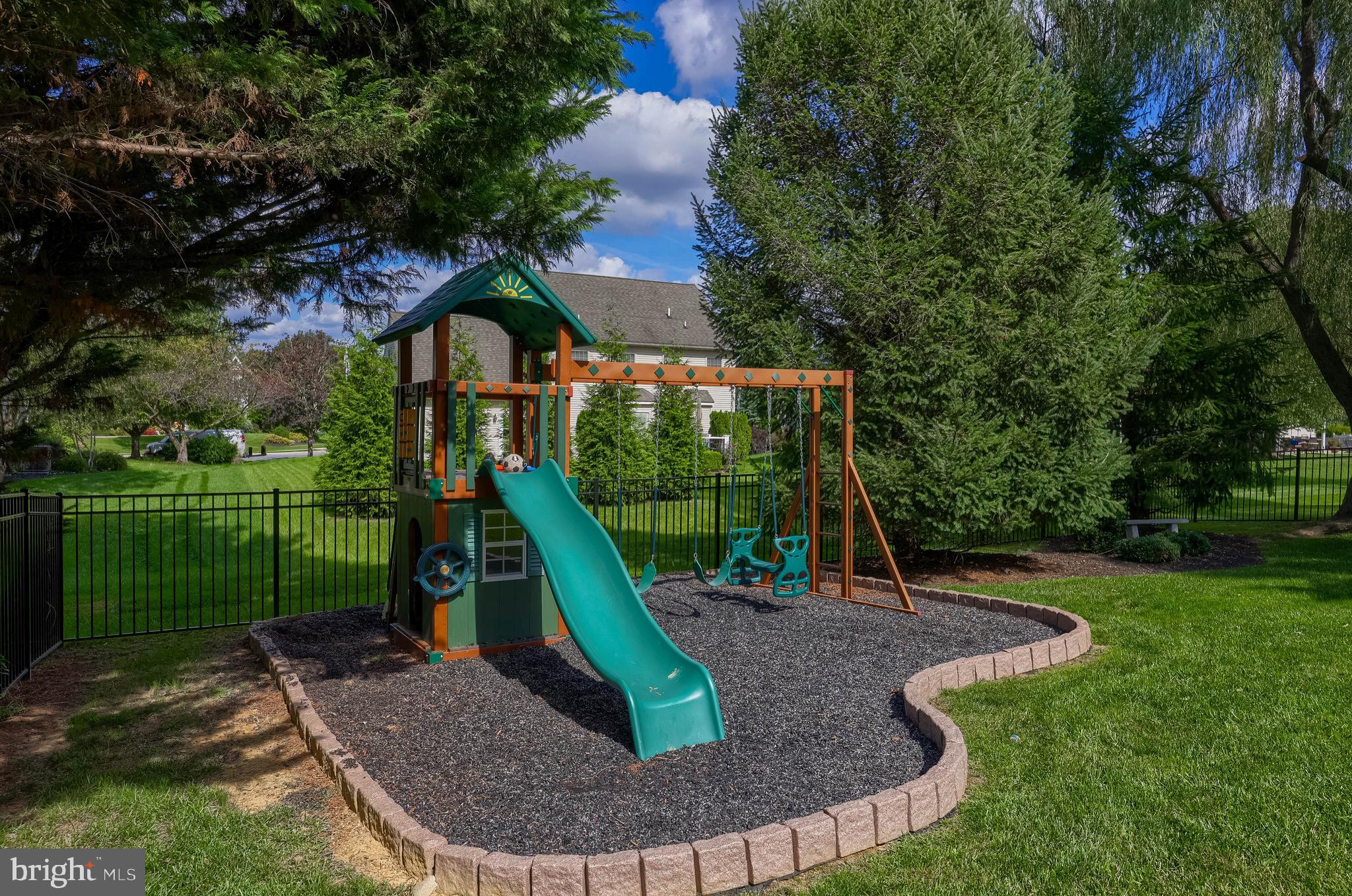 307 Bowyer Lane Lititz, PA 17543 - Photo 7 of 64 a view of a house with a swimming pool and garden