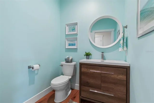 an aerial view of a house with a garden