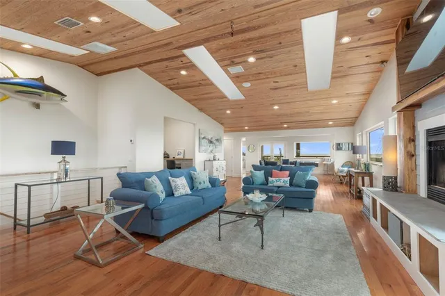 a kitchen with stainless steel appliances a sink stove and cabinets