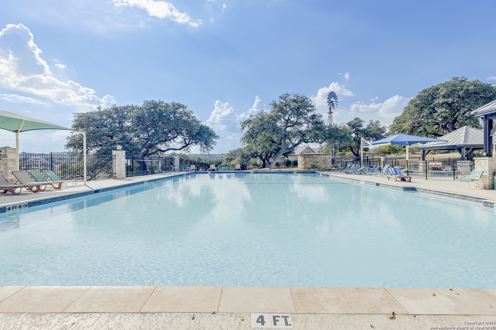534 Rock Trail Place Spring Branch, TX 78070 - Photo 16 of 27 a view of swimming pool and lake view