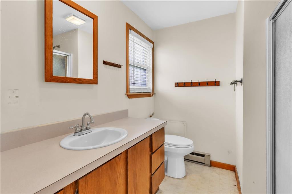 1636 Brodhead Road Coraopolis, PA 15108 - Photo 20 of 30 This master bathroom includes a stand-up shower and a window that welcomes morning sunlight.