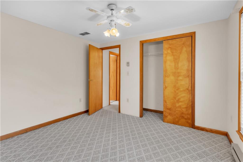 1636 Brodhead Road Coraopolis, PA 15108 - Photo 23 of 30 3rd bedroom measures 11'1" x 11'1" and also features a double closet, perfect for storage and organization.