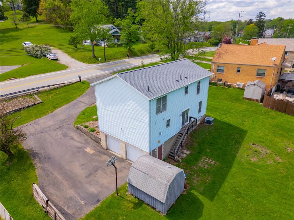 1636 Brodhead Road Coraopolis, PA 15108 - Photo 3 of 30 Bird’s-eye beauty! A brand-new roof enhances value and durability, while the oversized two-car garage offers ample storage and convenience