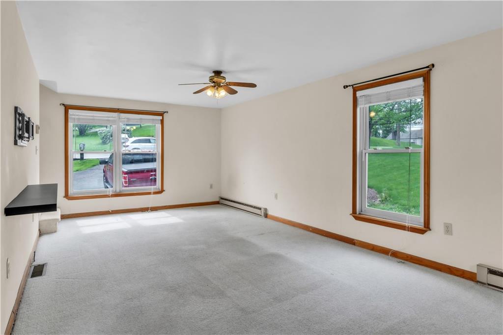 1636 Brodhead Road Coraopolis, PA 15108 - Photo 6 of 30 Bright and inviting! This spacious living room is bathed in natural light, thanks to its stunning large windows