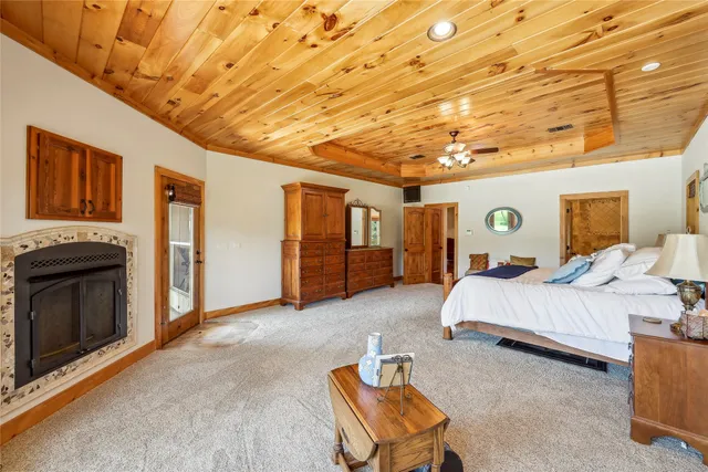 a bed room with a bed and a chair