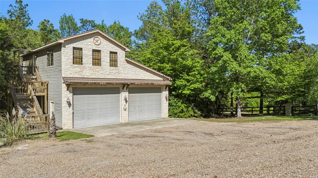 a kitchen with stainless steel appliances granite countertop a sink stove and wooden floor
