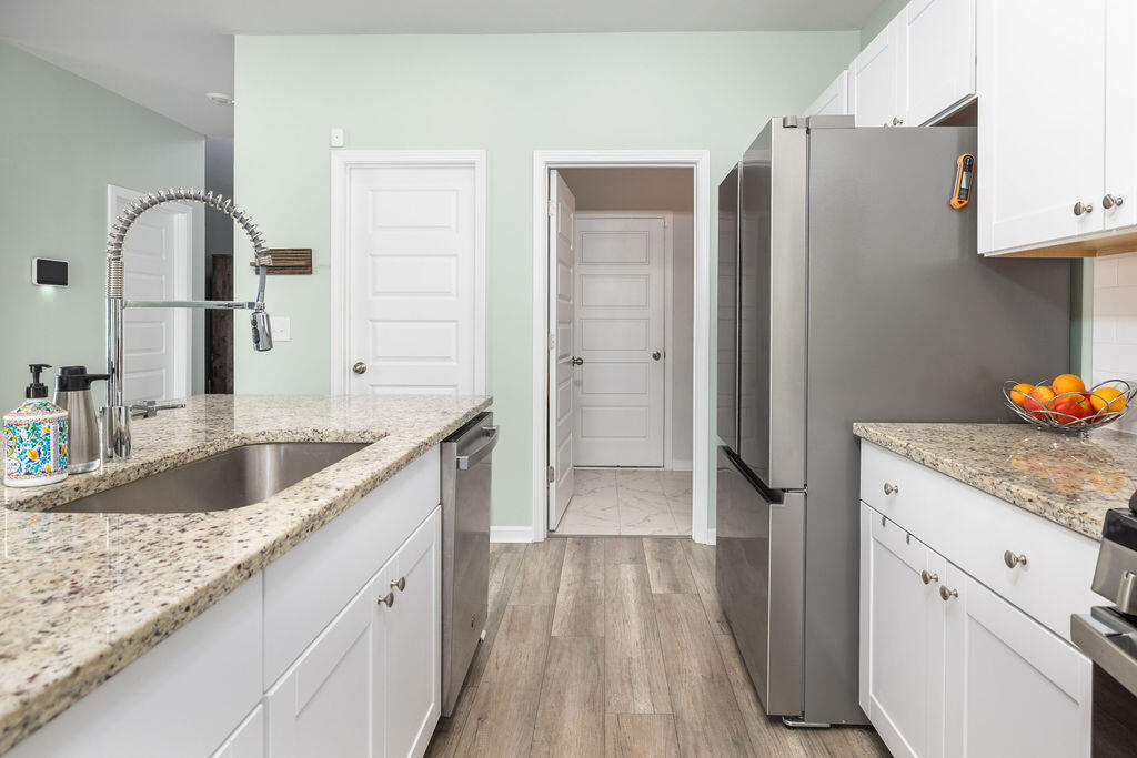 538 Spanish Wells Road Summerville, SC 29486 - Photo 16 of 41 kitchen leading to laundry and garage