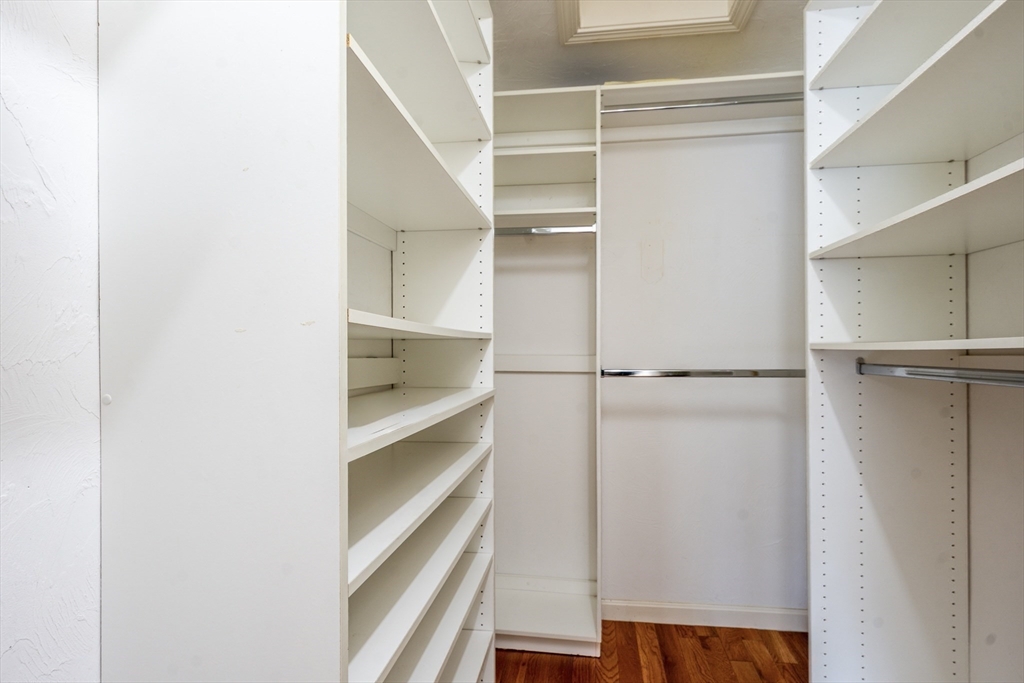 50 Pine Hill Boulevard, Unit 46 Mashpee, MA 02649 - Photo 12 of 19 a view of walk in closet with empty racks