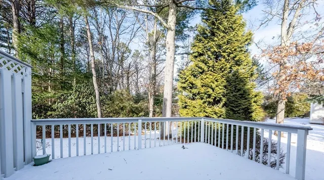 a view of a wooden roof deck